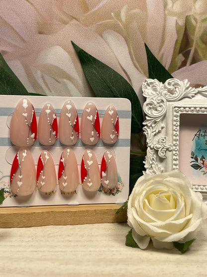 STAR CROSSED LOVERS - Set of 10 red abstract design nails with silver & white decoration